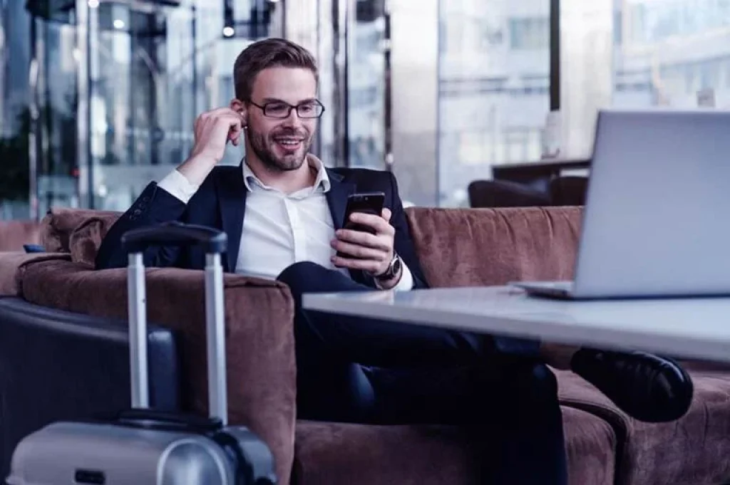 Man in the airport with AirPods